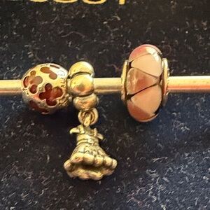 Vintage Pandora lavender and purple charms and dress on a hangar charm